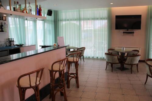 TV a/nebo společenská místnost v ubytování Hotel Palme Park & Beach included