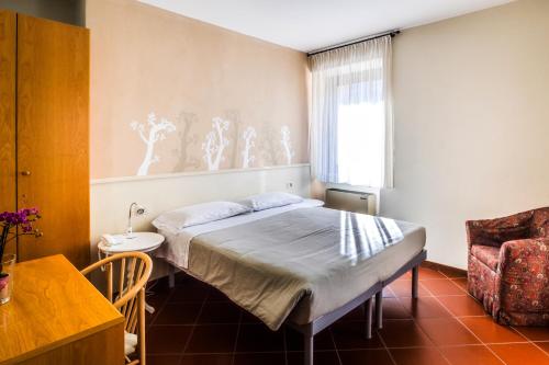 Posteľ alebo postele v izbe v ubytovaní Al Vecchio Palazzo