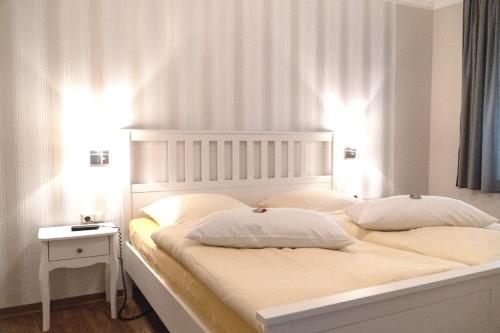 Voodi või voodid majutusasutuse Ferienresidenz Schlossblick toas