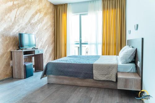 Säng eller sängar i ett rum på Gradina Holiday