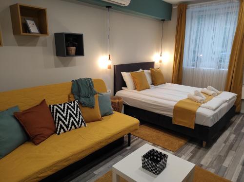 Postel nebo postele na pokoji v ubytování 7 days Apartment