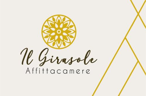 a logo for a restaurant with a gold mandala at IL GIRASOLE in Porto Torres