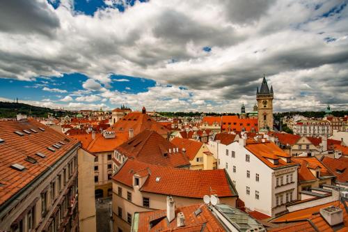 a city with red roofs and a clock tower at Residence St Havel Prague Old Town in Prague