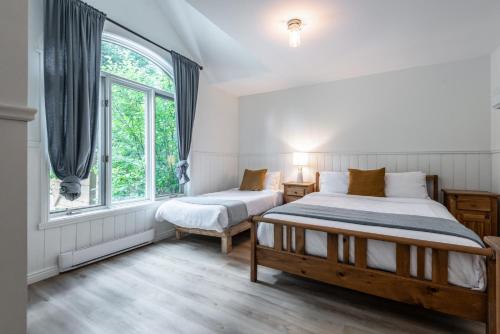 Ένα ή περισσότερα κρεβάτια σε δωμάτιο στο Chalet Chevreuil Zen