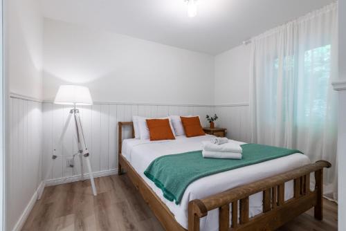 Postel nebo postele na pokoji v ubytování Chalet Chevreuil Zen