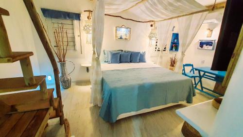 Кровать или кровати в номере Pousada Lua de Charme