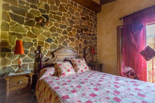 Postel nebo postele na pokoji v ubytování Casa Aingeru