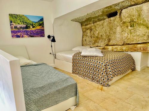 Postel nebo postele na pokoji v ubytování VILLA BEL - Entre paradis et vignes