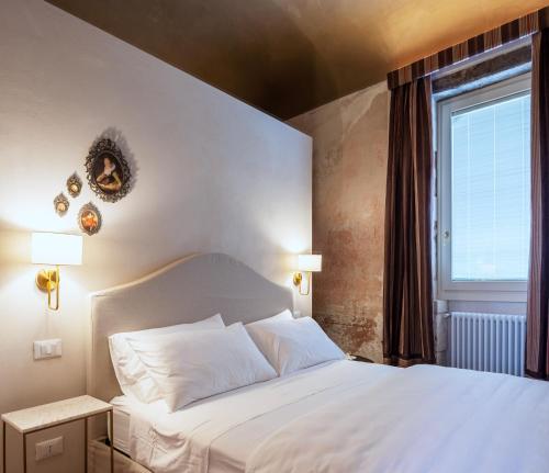 Легло или легла в стая в Boudoir degli Orti, Unconventional Stay in Borgata, Siracusa