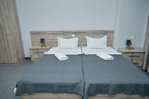 Ένα ή περισσότερα κρεβάτια σε δωμάτιο στο Hotel Muqaddas