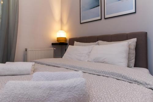 Postel nebo postele na pokoji v ubytování Apartman Park