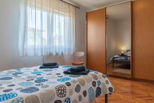 Postel nebo postele na pokoji v ubytování Apartman Maria