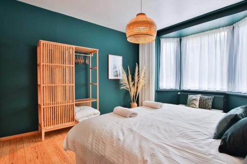 Postel nebo postele na pokoji v ubytování Logement L'échasseur à Jambes (NAMUR)