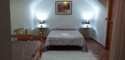 Krevet ili kreveti u jedinici u okviru objekta Casa Cueva Sol