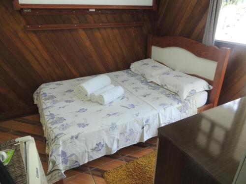 Ein Bett oder Betten in einem Zimmer der Unterkunft Pousada Coração da Ilha do Mel