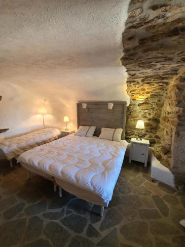 Tempat tidur dalam kamar di Ranch du Haut-Languedoc
