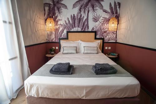 Ένα ή περισσότερα κρεβάτια σε δωμάτιο στο KRISSAIA SEASIDE SUITES