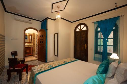 Letto o letti in una camera di Riad De La Semaine