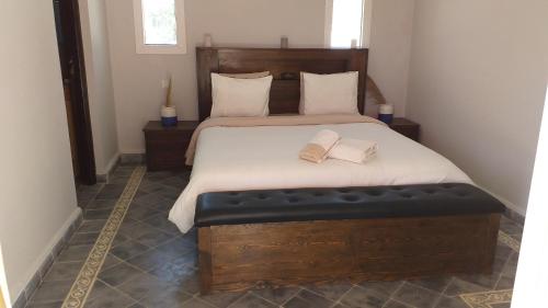 מיטה או מיטות בחדר ב-La Casita