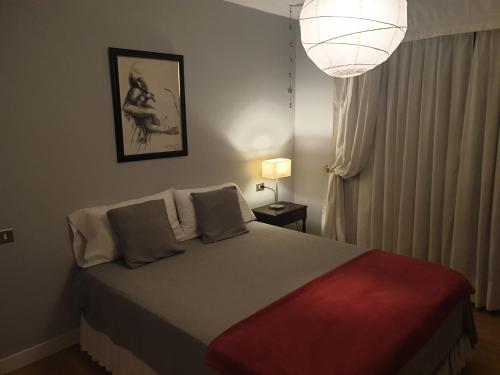 Postel nebo postele na pokoji v ubytování Apartamento Velázquez Moreno