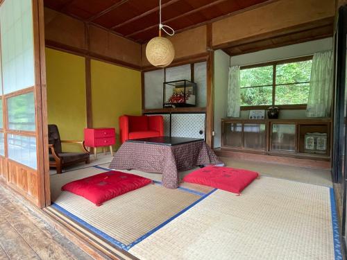 Tempat tidur dalam kamar di Akiu Canada 鴻の巣温泉