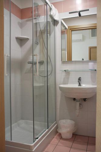 a bathroom with a shower and a sink at B&B & Residence Pozzo Misseo in Matera