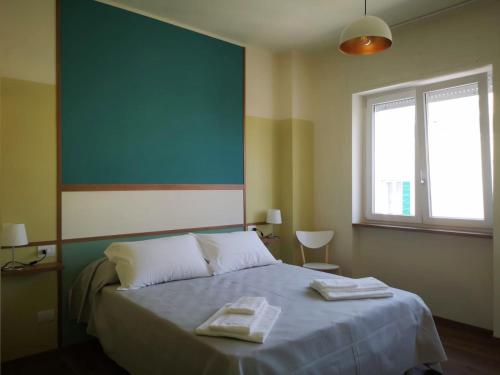 Postel nebo postele na pokoji v ubytování Fidardo Rooms