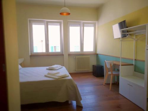 Postel nebo postele na pokoji v ubytování Fidardo Rooms