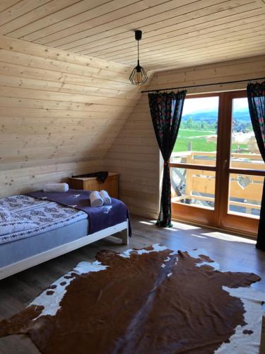Кровать или кровати в номере Domki Na Stoku