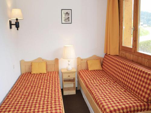 Katil atau katil-katil dalam bilik di Appartement Méribel, 2 pièces, 4 personnes - FR-1-182-7