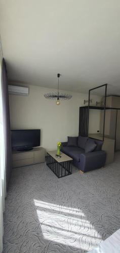 Ένα ή περισσότερα κρεβάτια σε δωμάτιο στο Casa Achim