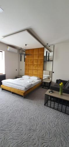 Ένα ή περισσότερα κρεβάτια σε δωμάτιο στο Casa Achim