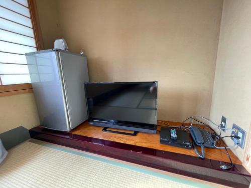 マリーナホテル海空にあるテレビまたはエンターテインメントセンター