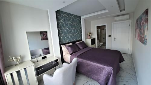 A bed or beds in a room at Art City Luxury Residence in the Center of Alanya