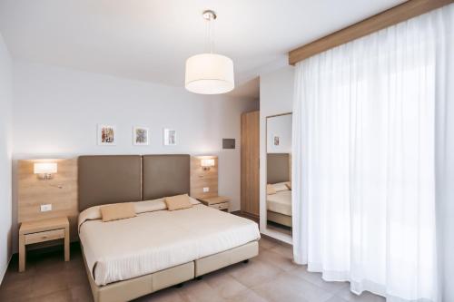 Postel nebo postele na pokoji v ubytování Rooms Angedras