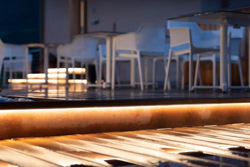 a group of chairs sitting on top of a table at SILVANELLO Apartment in Trento