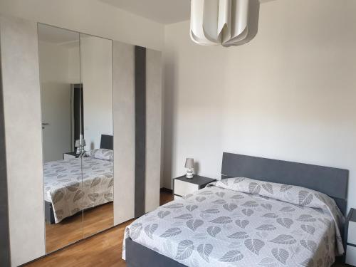 A bed or beds in a room at Casa Fiorella