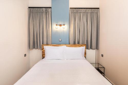 Posteľ alebo postele v izbe v ubytovaní Oikion Meteora Home 3