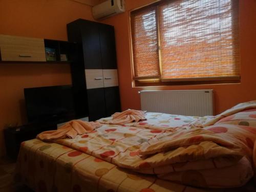 Кровать или кровати в номере Apartmani Bambola