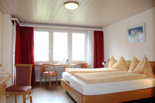 Voodi või voodid majutusasutuse Hotel Eigerblick toas