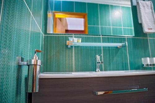 Ванна кімната в NOUBOU INTERNATIONAL HOTEL BONAPRISO