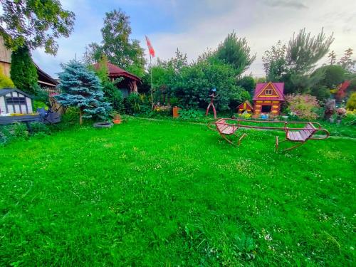 Κήπος έξω από το Bajeczny Wypoczynek Apartamenty