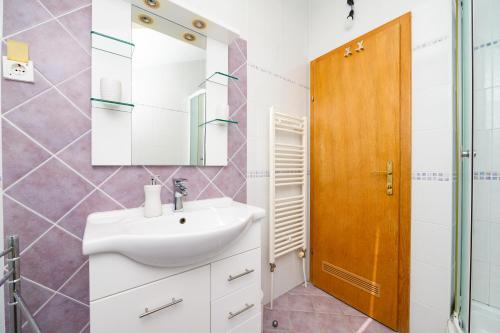 Phòng tắm tại Apartmani Loreta
