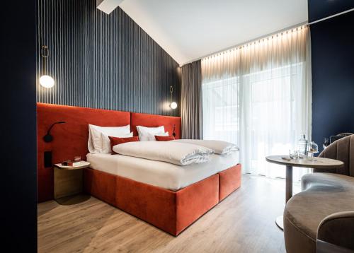 Letto o letti in una camera di Goldstück - Adults Only