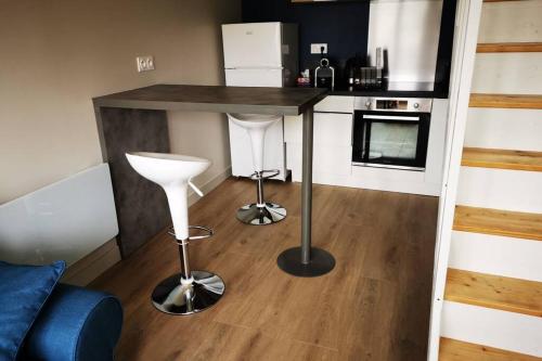 Η κουζίνα ή μικρή κουζίνα στο Logement entier à LA CRECHE