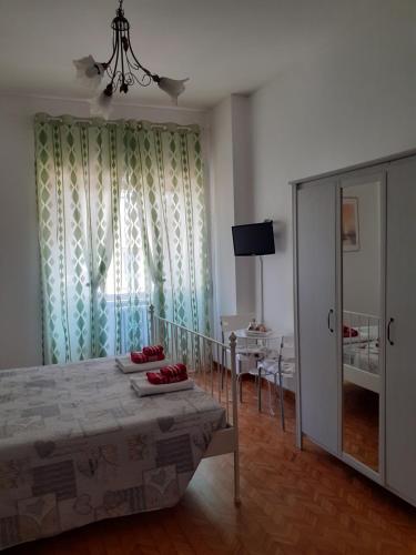 Postel nebo postele na pokoji v ubytování Il Papavero Nero