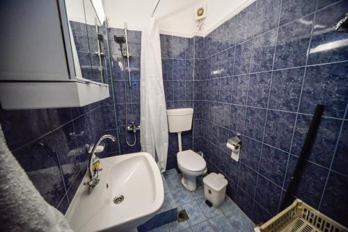 Kúpeľňa v ubytovaní Apartman Porto Blue Lux