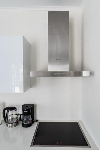 Dapur atau dapur kecil di The Palm Leaf Apartments