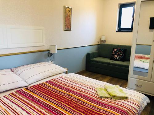 Postel nebo postele na pokoji v ubytování Apartmánový dom Andalusia