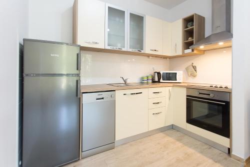 Iris apartment private parking tesisinde mutfak veya mini mutfak